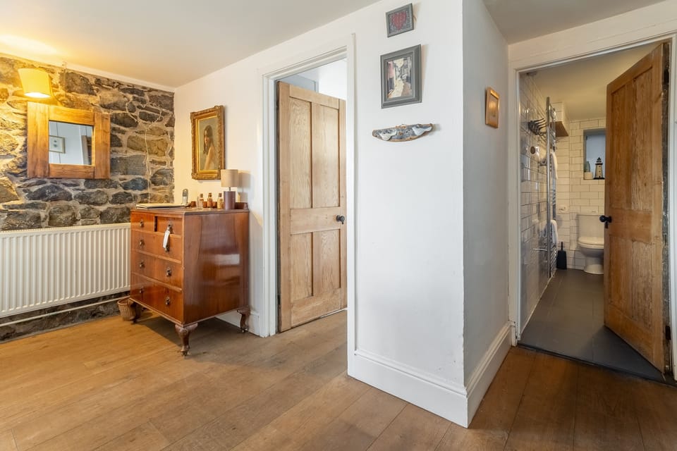 The Watch House, Coverack. Ground floor: Hallway leading to family bathroom with shower, wash basin and WC