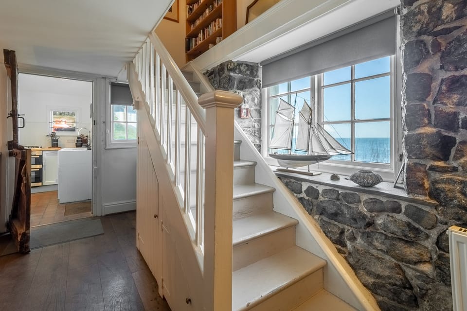 The Watch House, Coverack. Ground floor leading to first floor