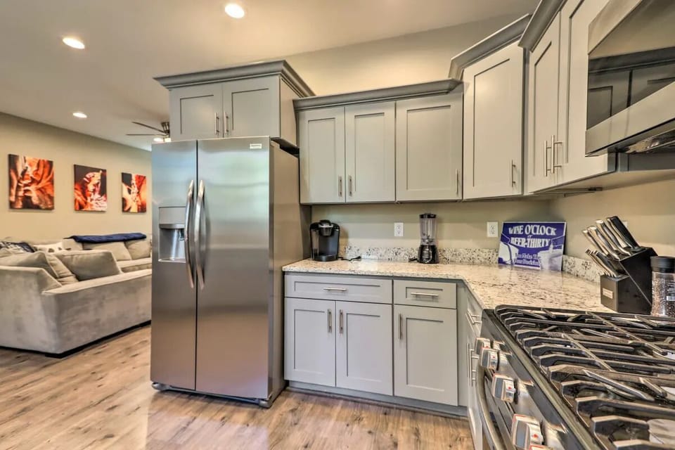 Fully stocked kitchen with gas stove and oven