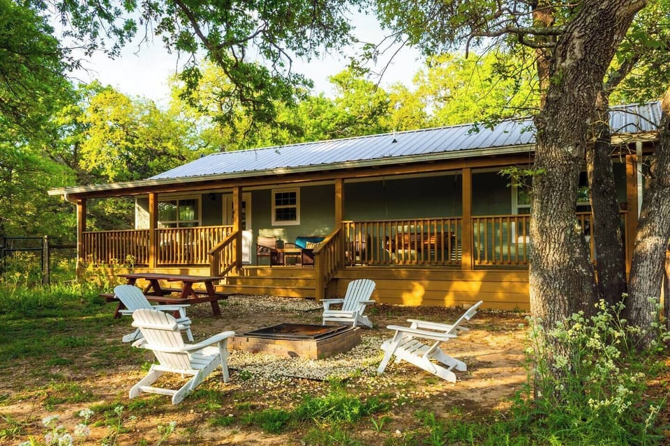 Fenced backyard with firepit and amazing porch