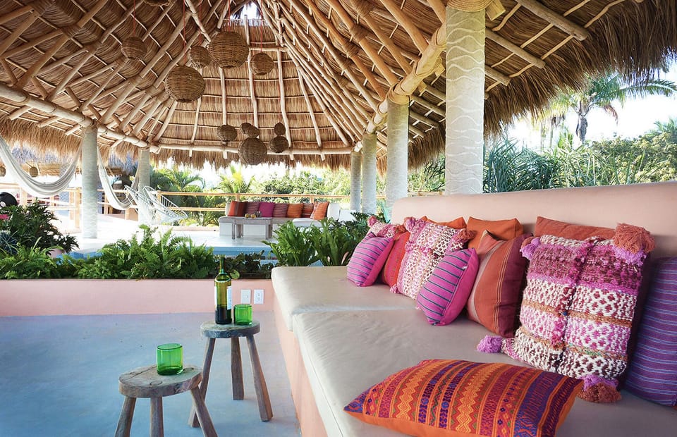 The living room lounging area with view of the Ocean