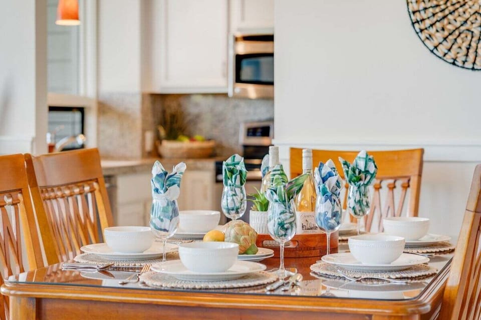 Enjoy the convenience of a dining area located steps from a fully equipped kitchen.