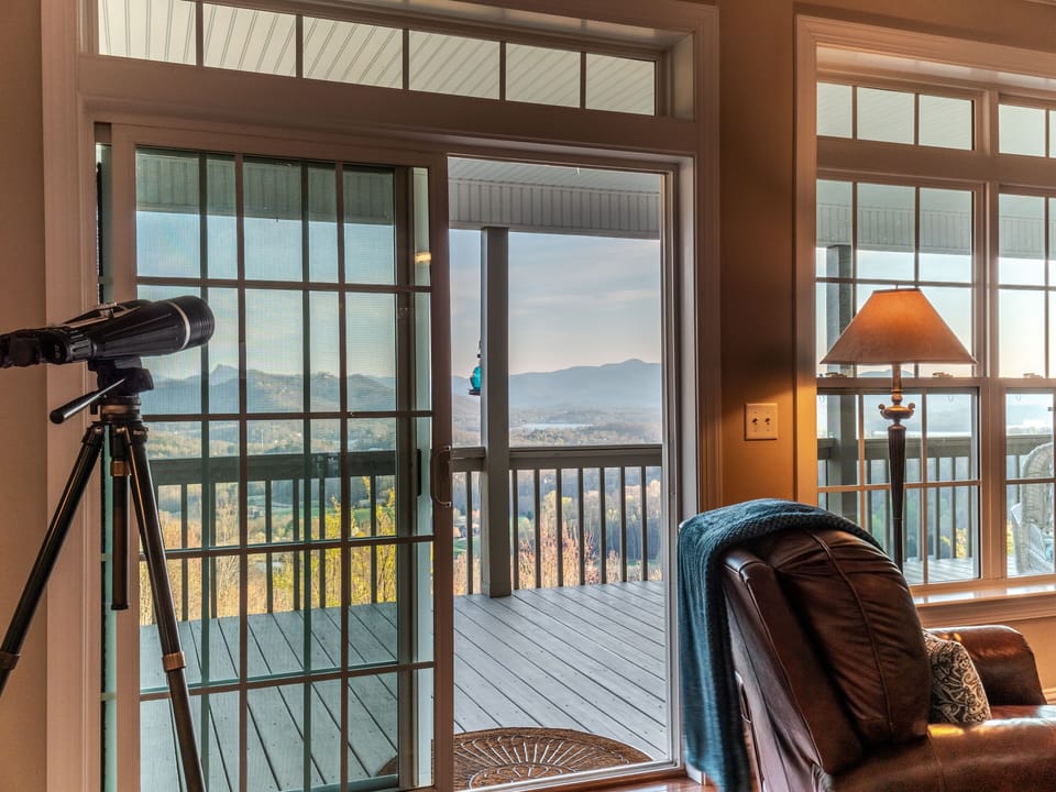 French sliding doors from living to back porch to enjoy the wonderful views