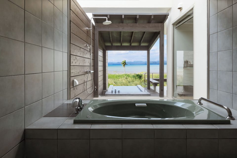 Ocean View Bath Suite | Bathroom | Combined shower/tub, deep soaking tub, hydromassage showerhead