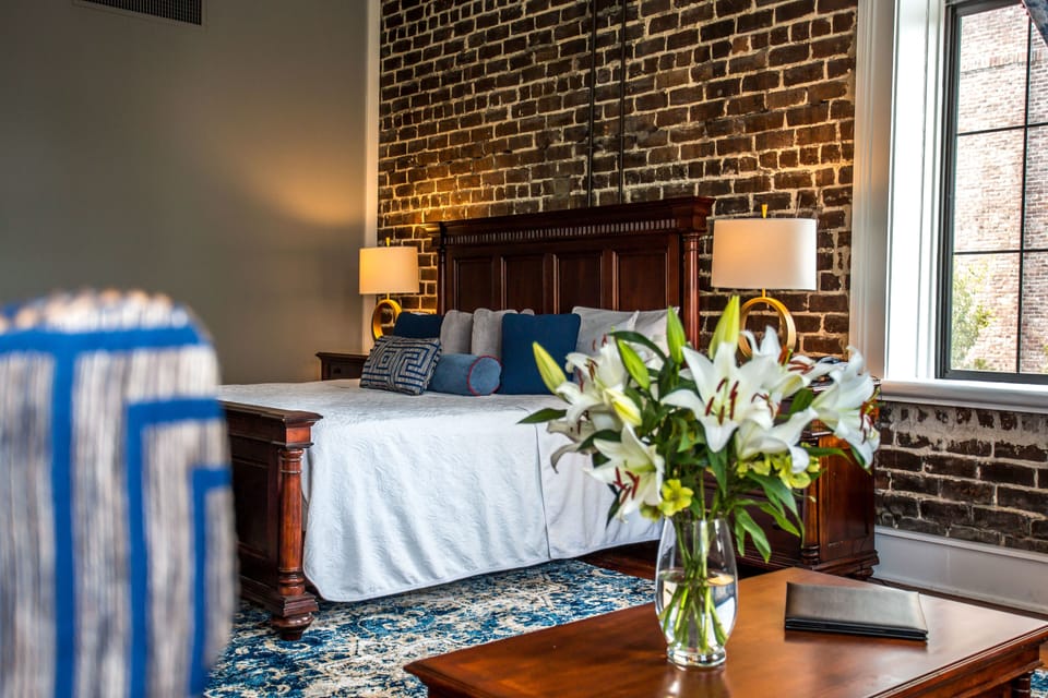 Suite, 1 King Bed, Corner | In-room safe, desk, laptop workspace, blackout drapes