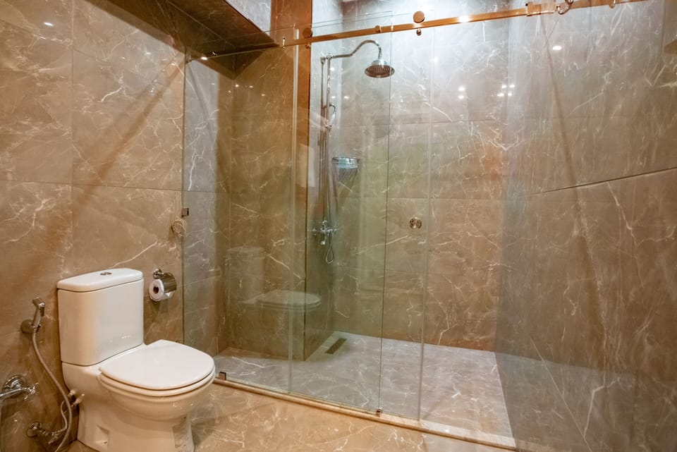 Shower, free toiletries, hair dryer, slippers