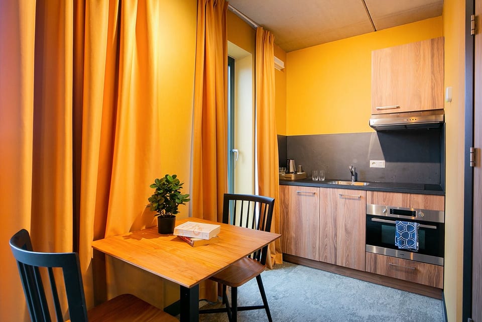 Deluxe Studio, Balcony | Private kitchen | Coffee/tea maker