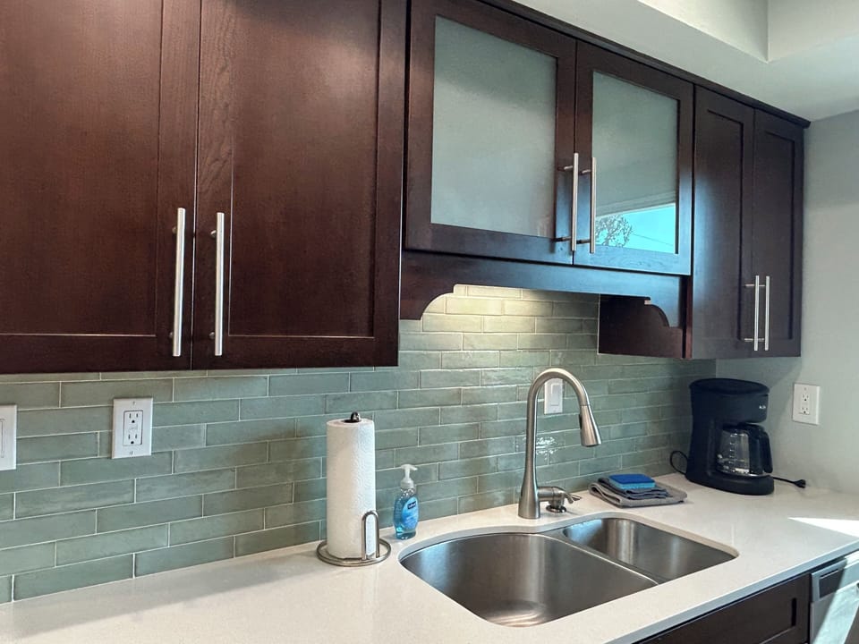 Updated with quartz counters and beautiful wall tiles.