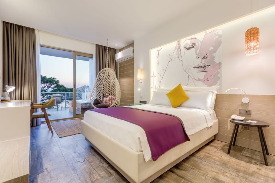 Deluxe Quadruple Room, Jetted Tub, Sea View | Premium bedding, memory foam beds, minibar, in-room safe