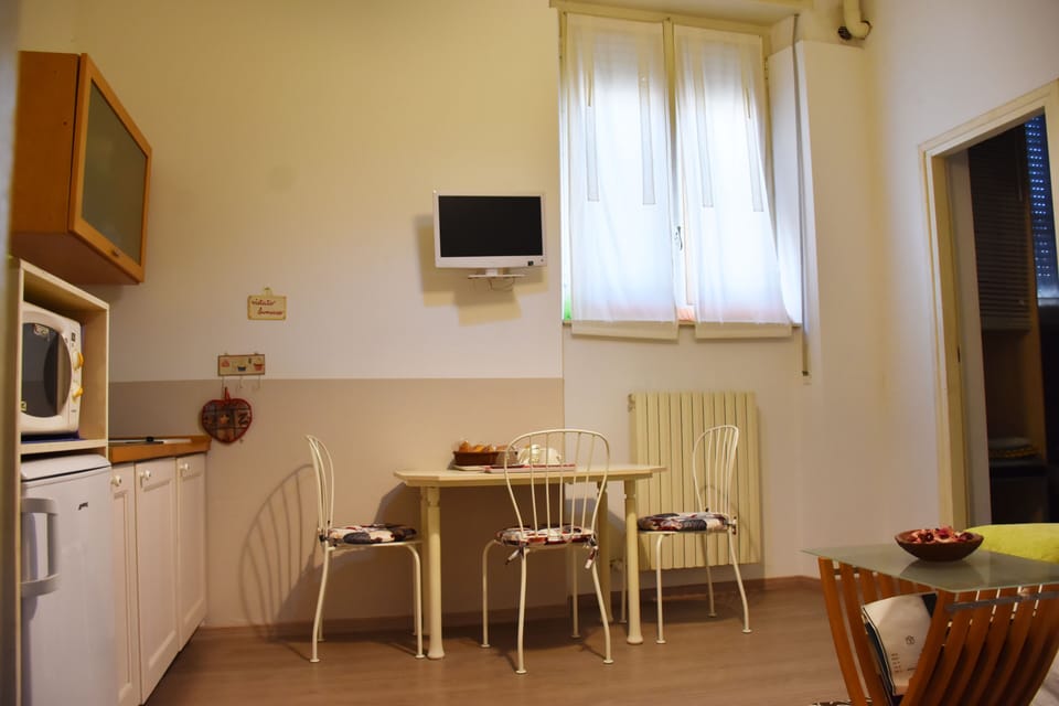 Standard Apartment, 1 Bedroom | Living area | 20-inch flat-screen TV with digital channels, TV