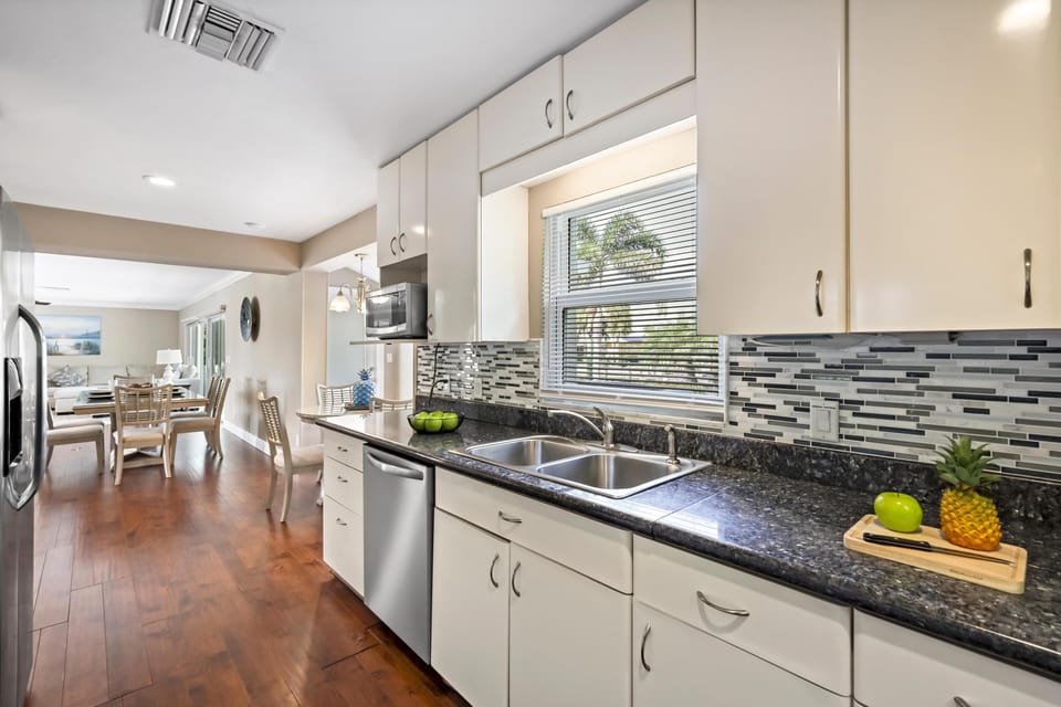 House, Multiple Beds (Pet-friendly two-story home with pool) | Private kitchen | Fridge, microwave, oven, stovetop