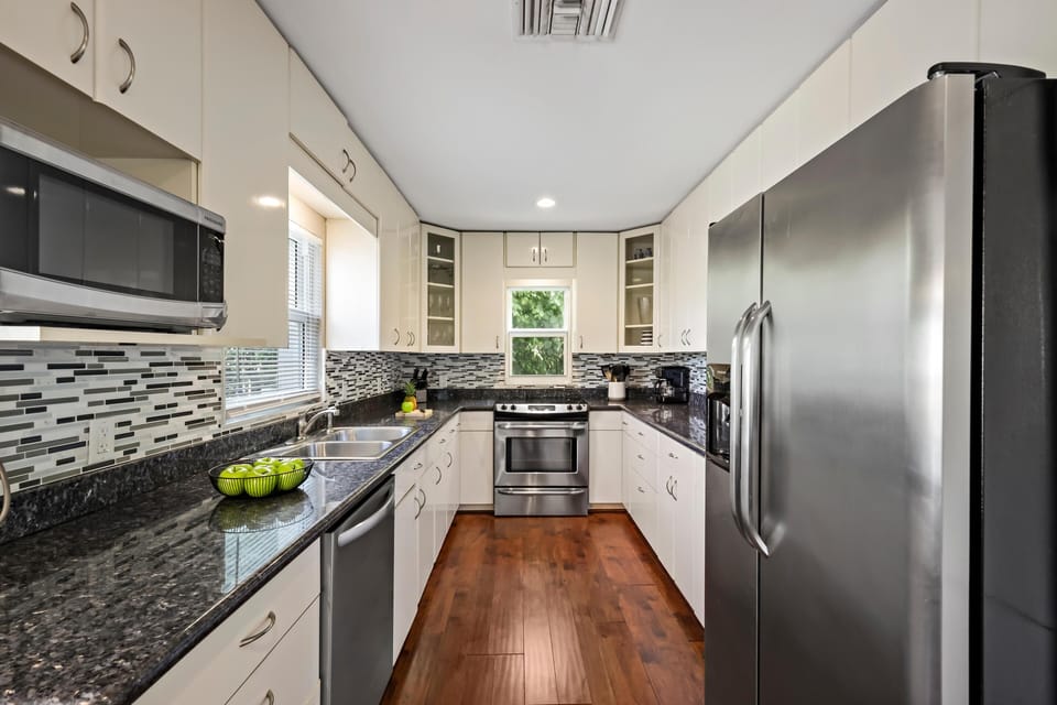 House, Multiple Beds (Pet-friendly two-story home with pool) | Private kitchen | Fridge, microwave, oven, stovetop
