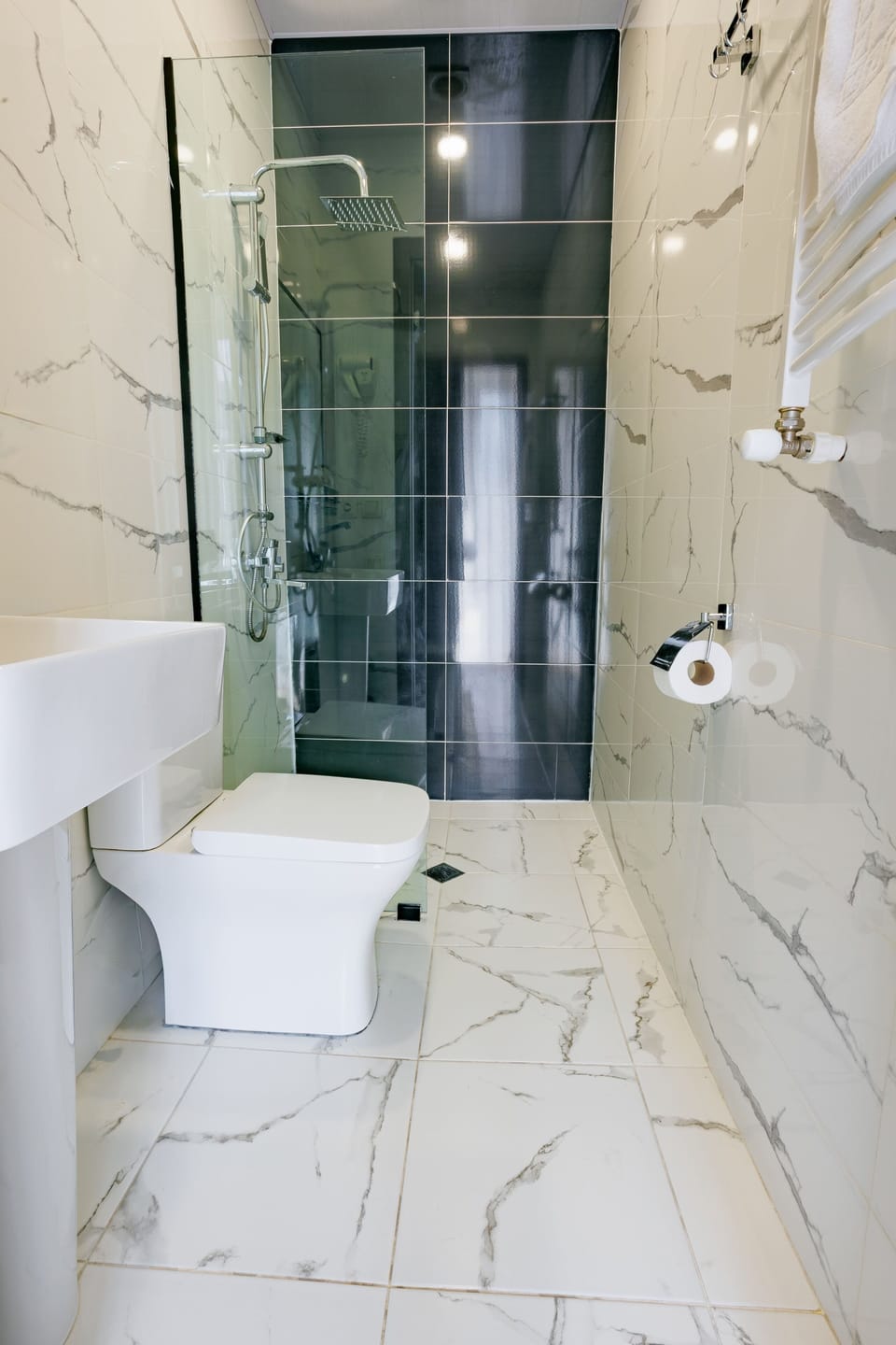 Shower, free toiletries, hair dryer, slippers