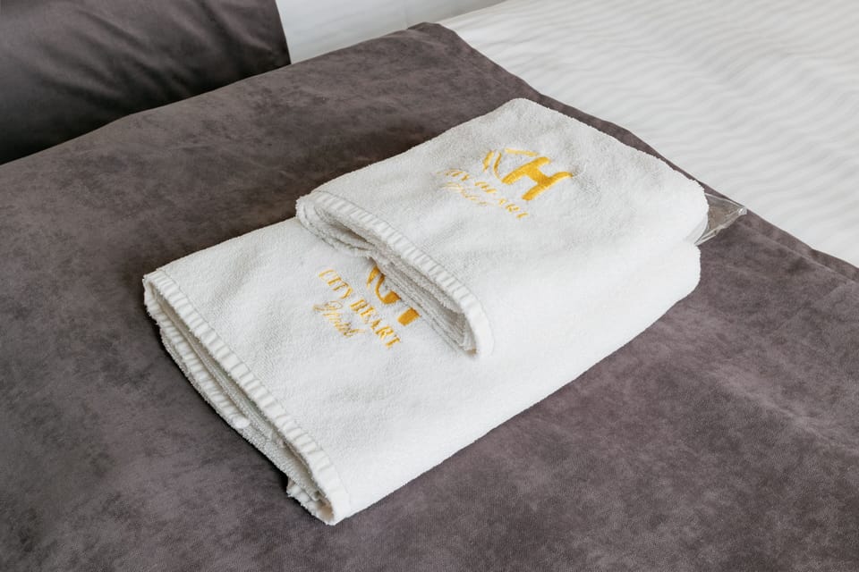 Premium bedding, down comforters, memory foam beds, iron/ironing board