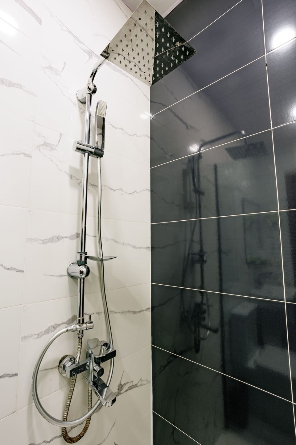 Shower, free toiletries, hair dryer, slippers