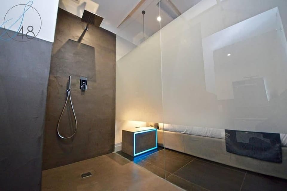 Shower, rainfall showerhead, eco-friendly toiletries, hair dryer