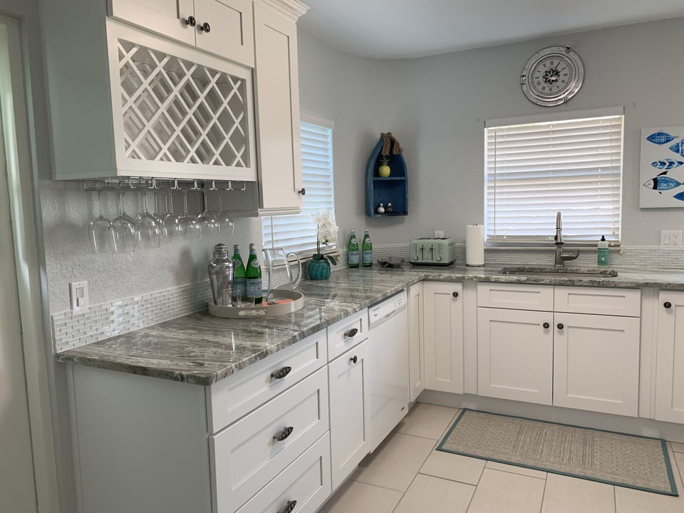 Beautiful new kitchen with quartzite counters, wine rack, & great storage.