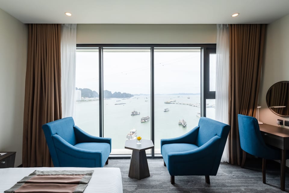 Premium Double Room | Living room | 32-inch LCD TV with satellite channels, TV