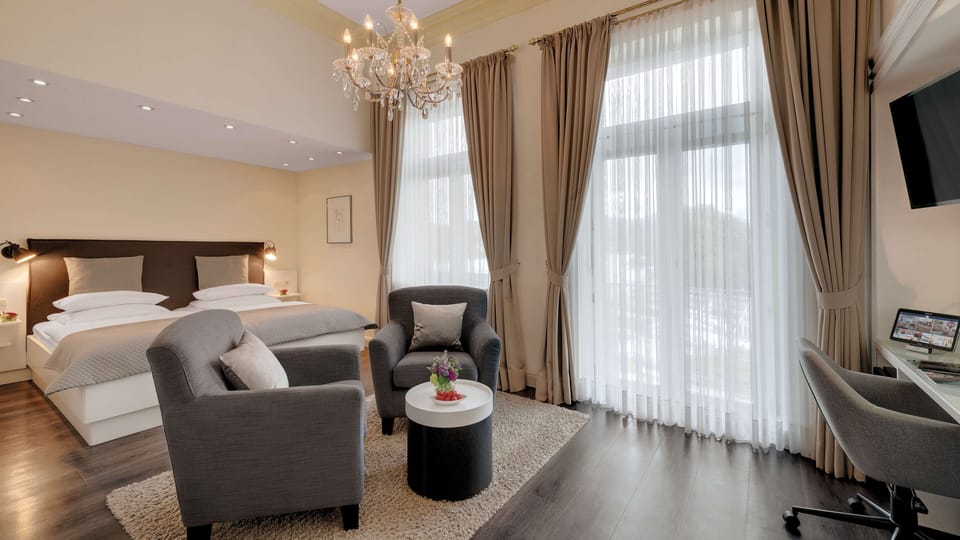 Hypo-allergenic bedding available, desk, blackout drapes