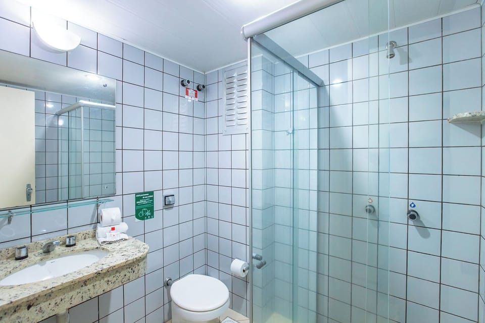 Standard Twin Room, 2 Twin Beds | Bathroom | Shower, hair dryer, towels, soap