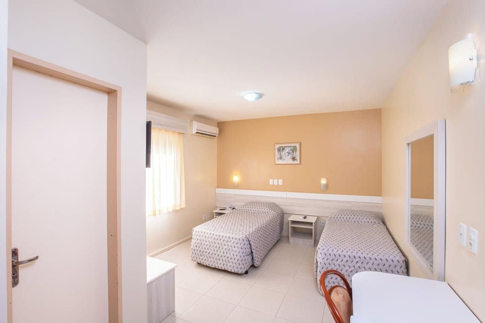 Standard Twin Room, 2 Twin Beds | Minibar, in-room safe, desk, blackout drapes
