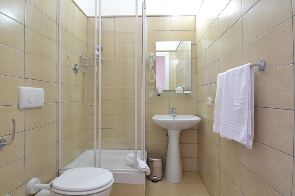Shower, rainfall showerhead, towels