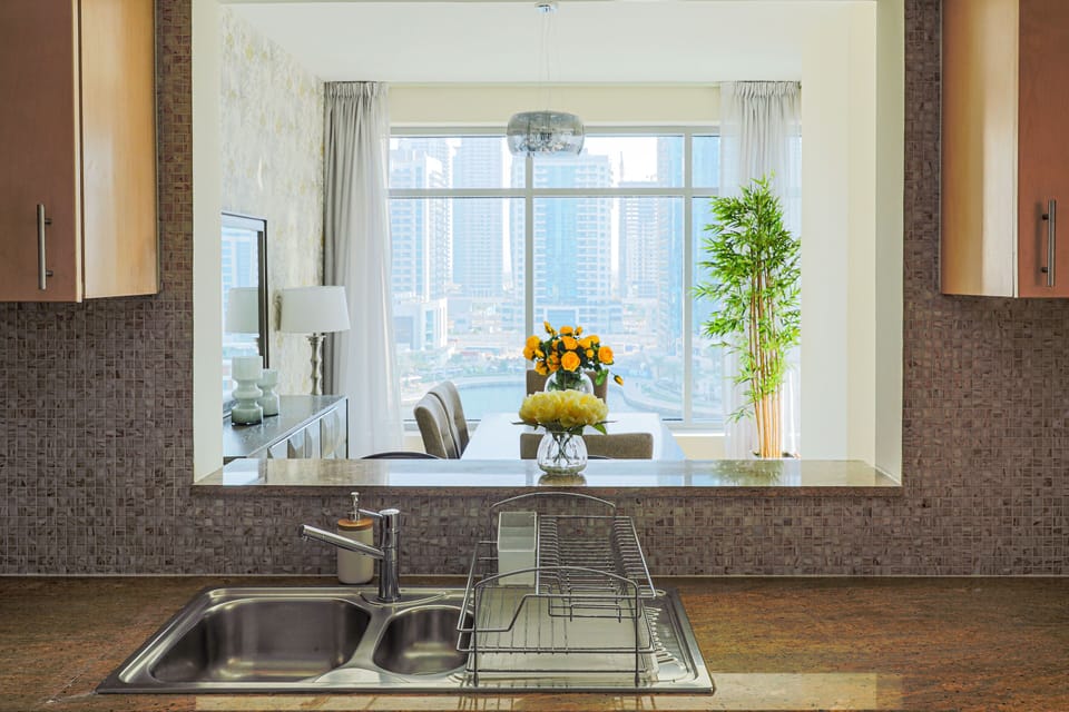 Deluxe Apartment, 2 Bedrooms | Private kitchen | Full-size fridge, microwave, oven, stovetop