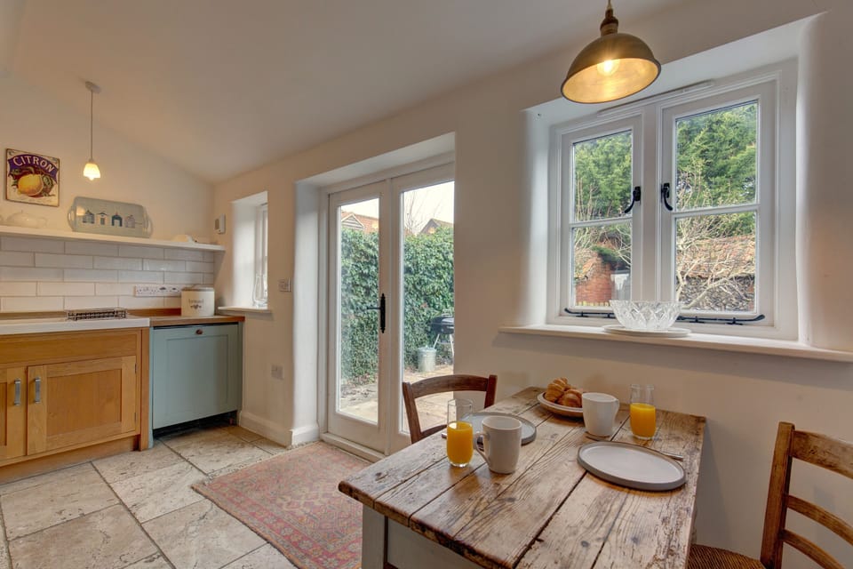 Ground floor: Access into the enclosed courtyard at the rear of the property