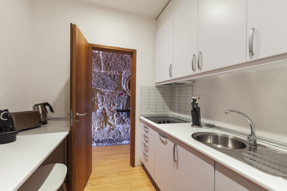 Standard Apartment, 1 Bedroom, River View | Private kitchen | Microwave, oven, stovetop, dishwasher