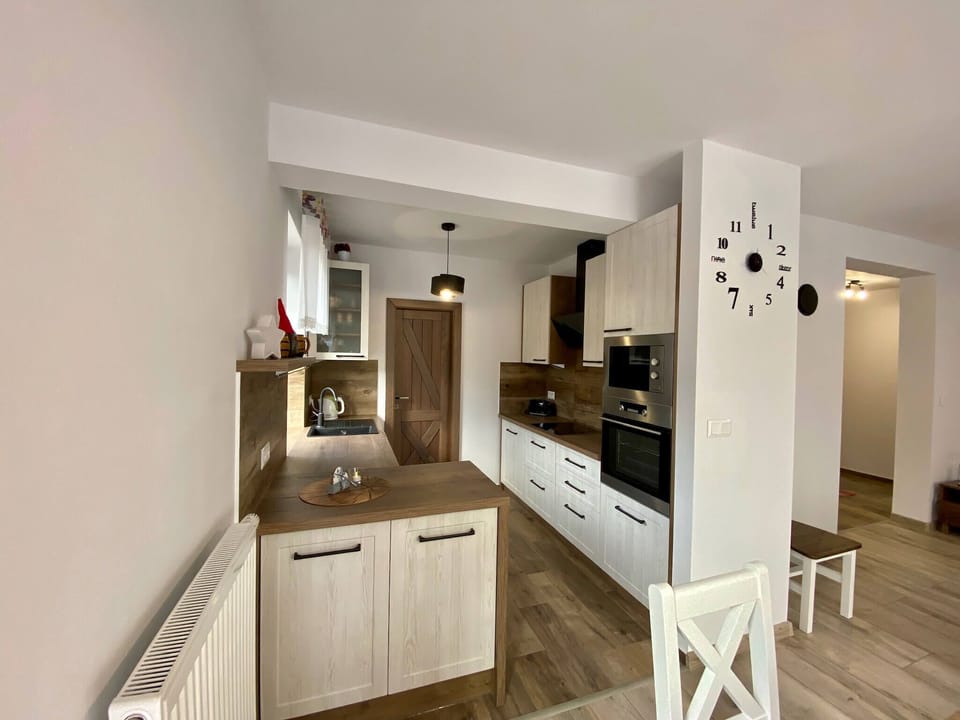 Family Villa | Private kitchen | Fridge, microwave, oven, stovetop