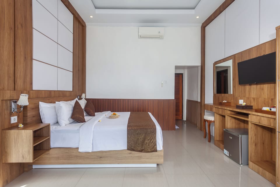 Minibar, desk, bed sheets