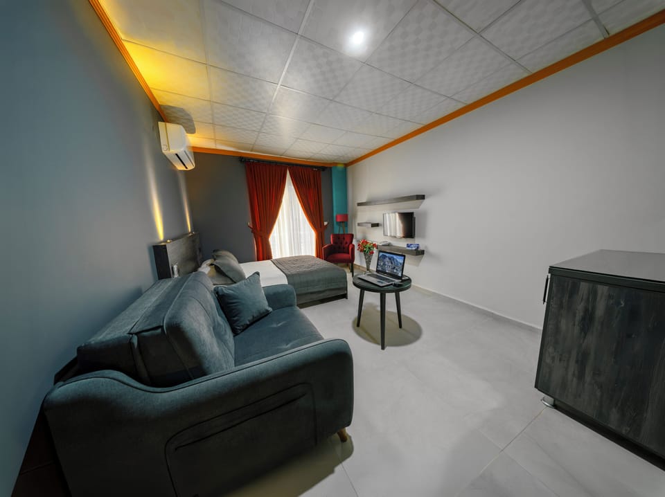 Deluxe Room | In-room safe, blackout drapes, iron/ironing board, free WiFi