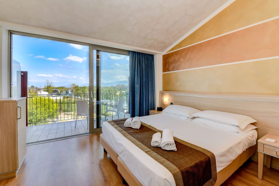 Double Room (River side) | Minibar, in-room safe, desk, laptop workspace