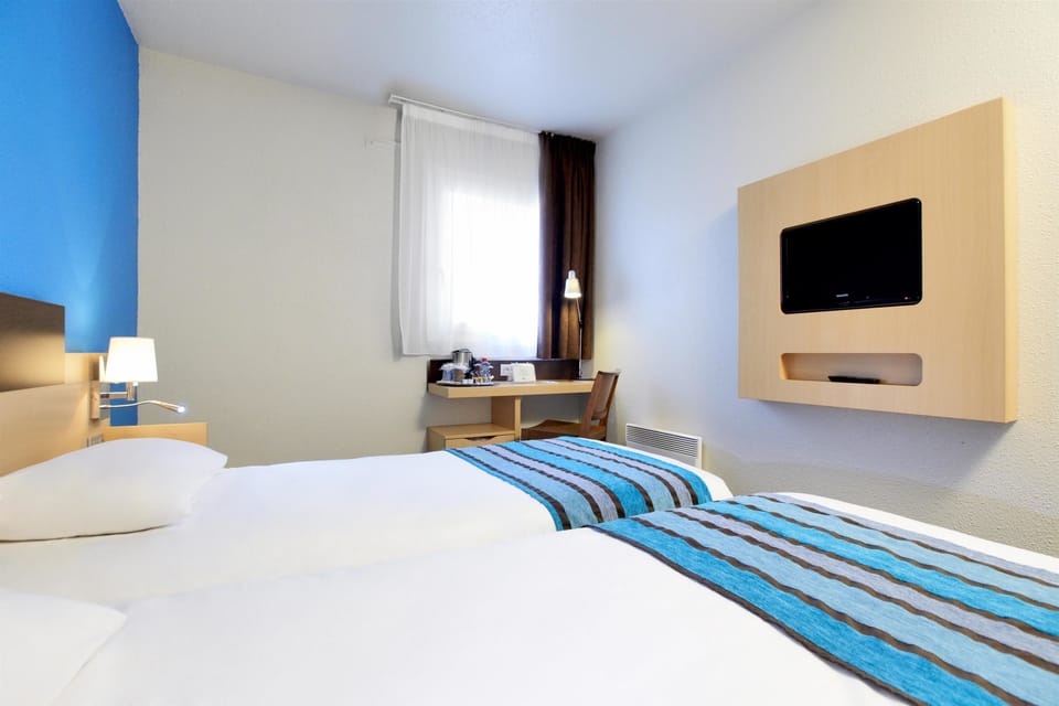 Standard Room, 2 Twin Beds | Desk, blackout drapes, soundproofing, iron/ironing board