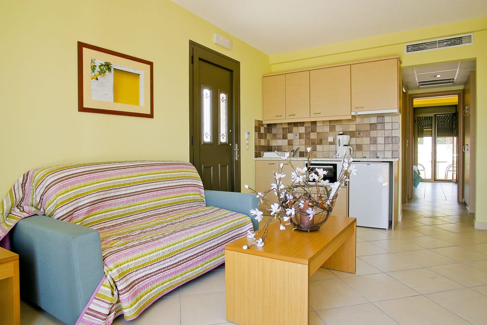 Apartment, 1 Bedroom, Partial Sea View | Living area | LCD TV