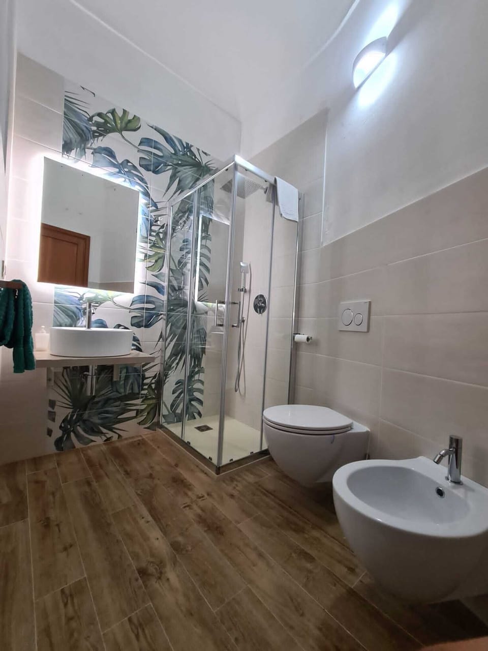 Deluxe Triple Room, Non Smoking | Bathroom | Shower, rainfall showerhead, free toiletries, hair dryer