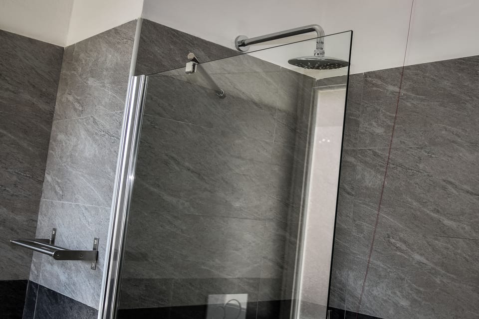 Shower, rainfall showerhead, eco-friendly toiletries, hair dryer