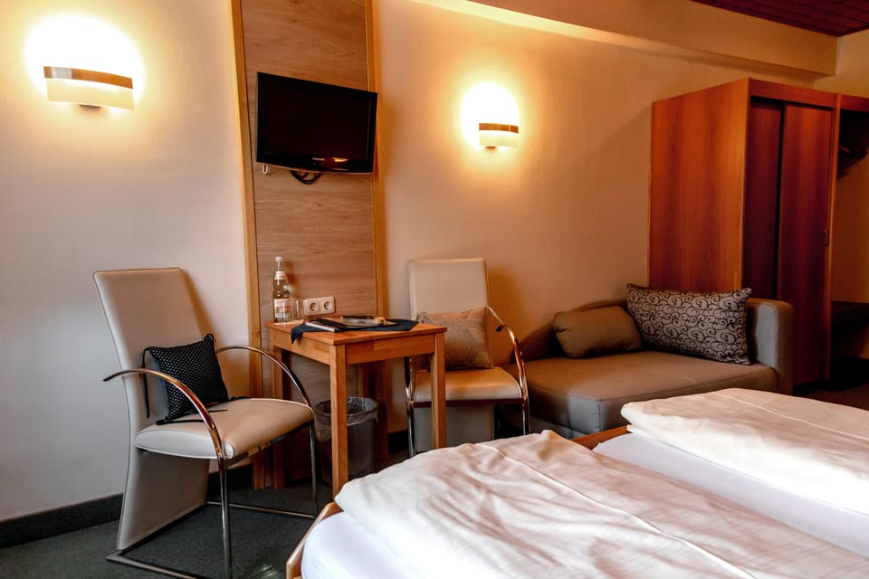 Classic Double Room, Ensuite | Living area | Flat-screen TV