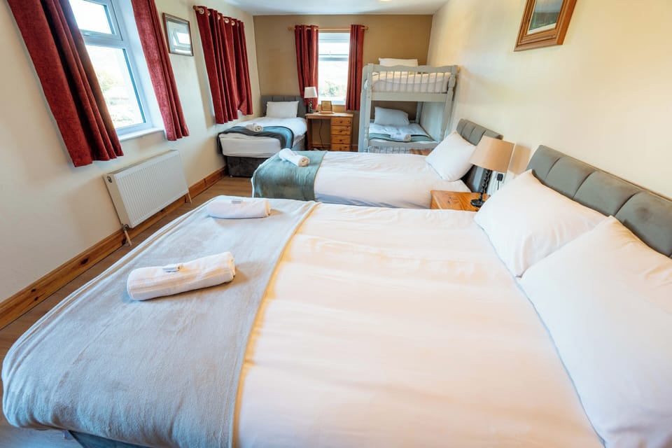 Family Room, Private Bathroom, Sea View | Premium bedding, pillowtop beds, desk, iron/ironing board