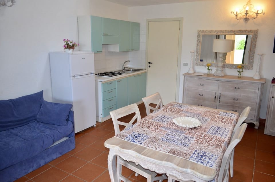 Apartment, 1 Bedroom | Living area | 32-inch flat-screen TV with digital channels, TV