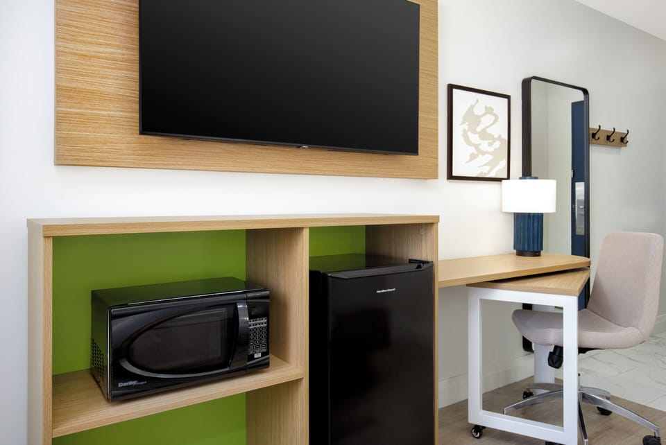 Desk, iron/ironing board, WiFi (free), alarm clocks