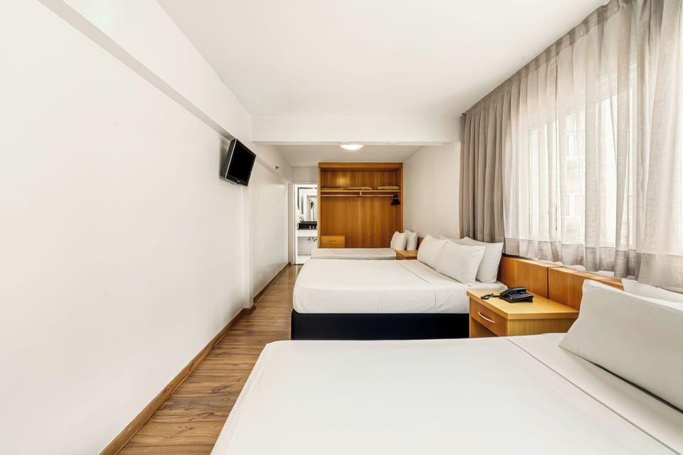 Family Room | 10 bedrooms, minibar, desk, laptop workspace