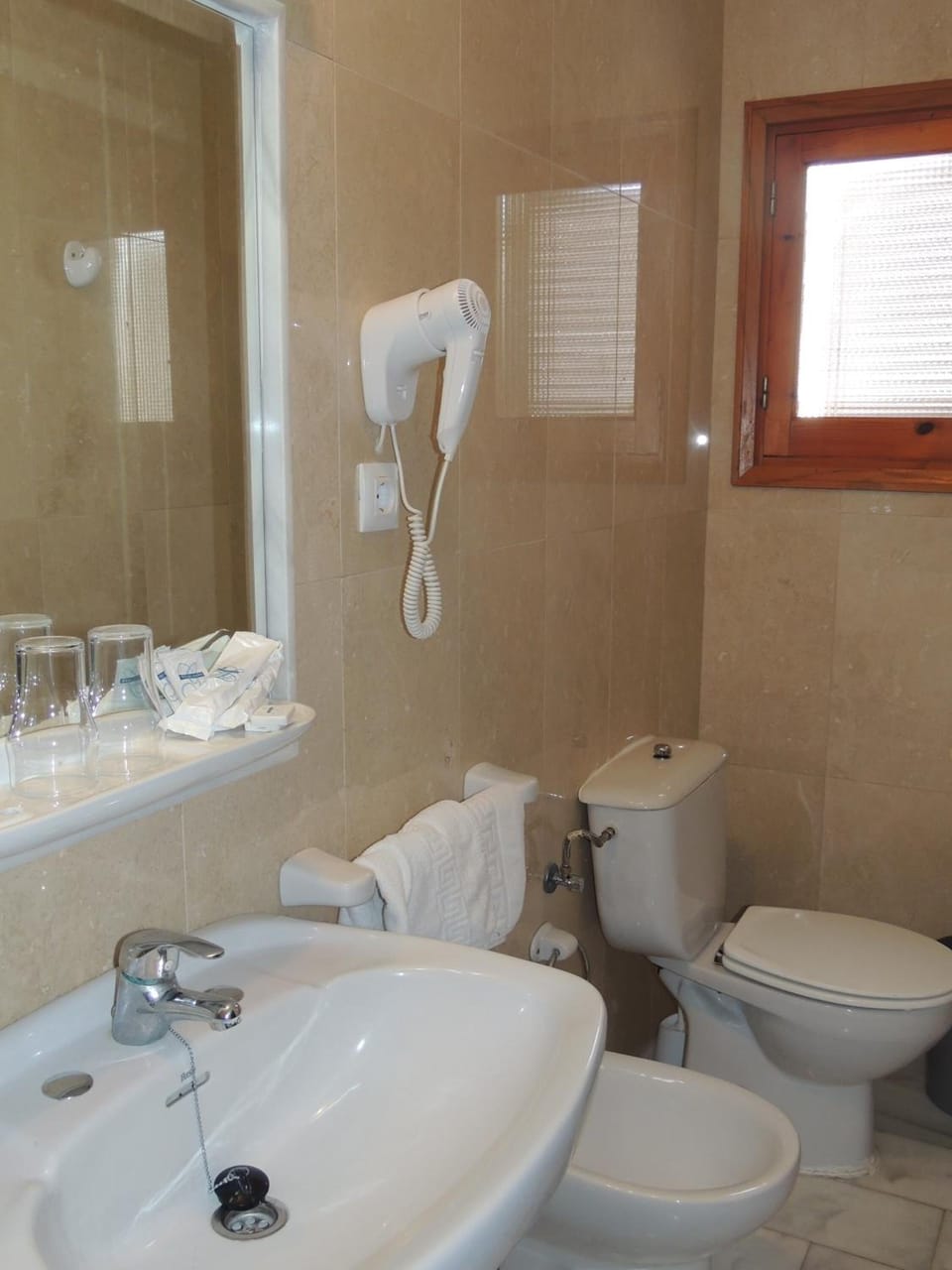 Free toiletries, hair dryer, bidet, towels