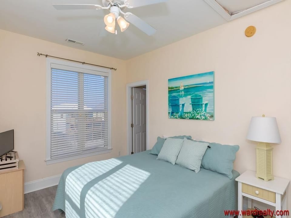 Top Floor Street-Side Master Bedroom with King Bed