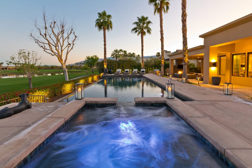 Large outdoor area with a 25,000 gallon salt water pool and spa. 