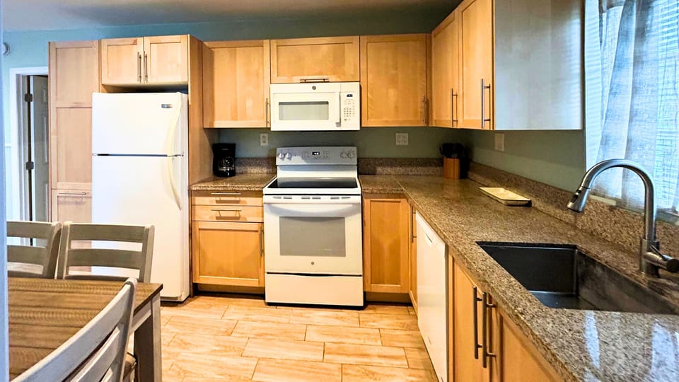 Full Kitchen – Stocked with the essentials you need to cook meals at home.