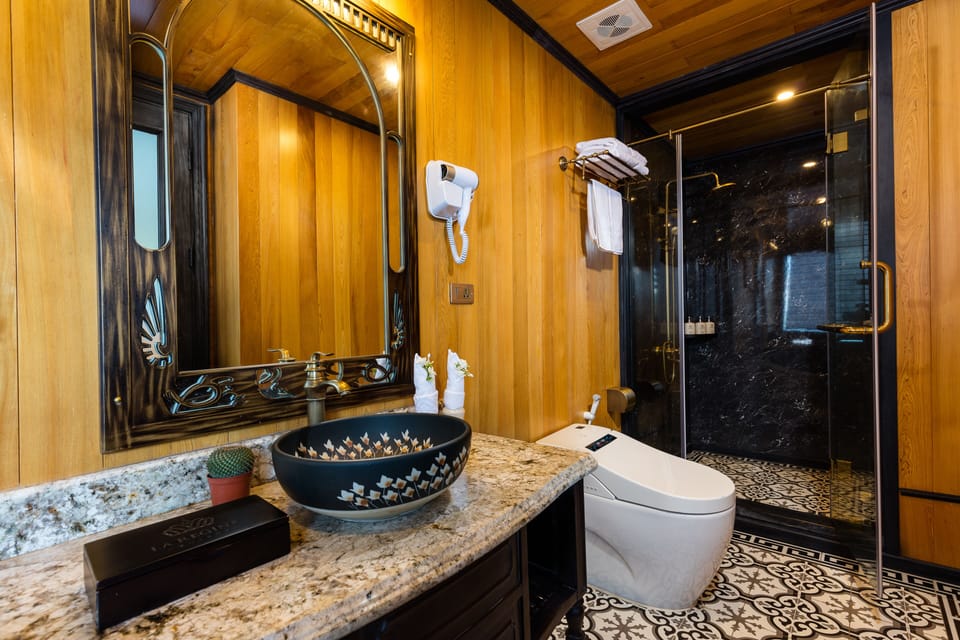 Separate tub and shower, free toiletries, hair dryer, slippers