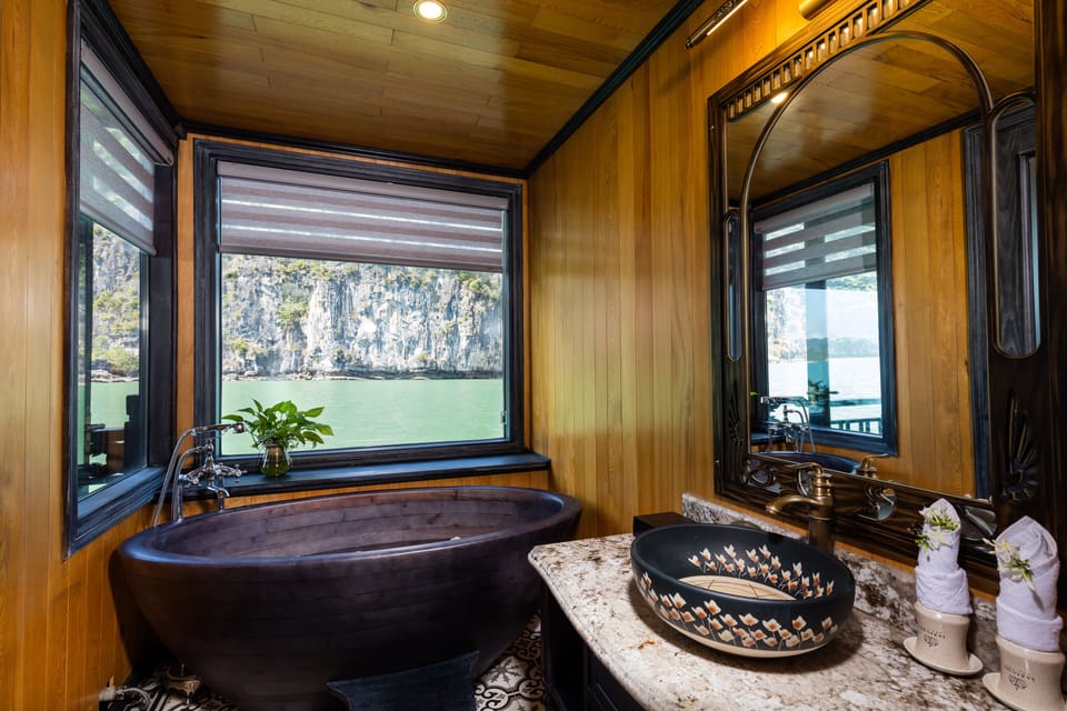Separate tub and shower, free toiletries, hair dryer, slippers
