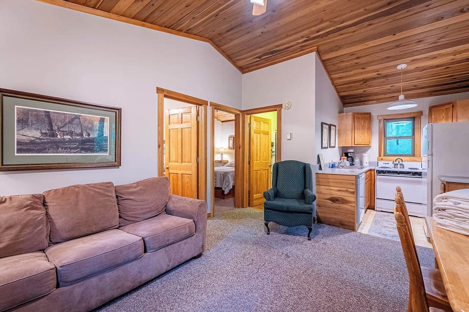 View from the living room. Doorways are bedrooms and bathroom.