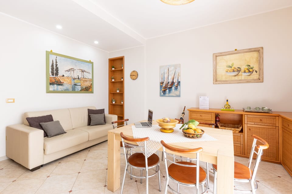 Apartment, 3 Bedrooms | Living area | Flat-screen TV